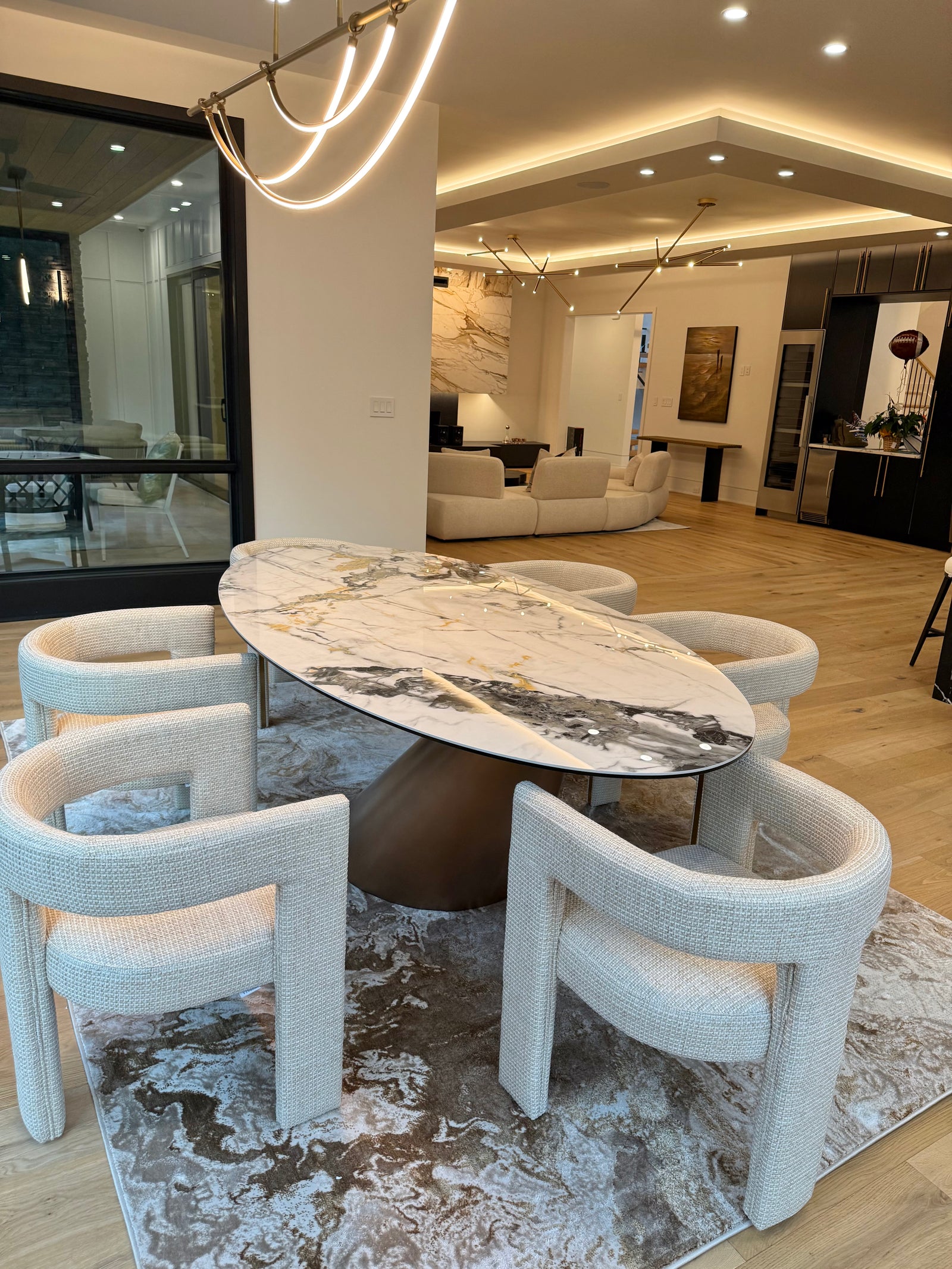 Contemporary Retreat in McLean living room in McLean Virginia featuring the Verve Sculpted Dining Chair and Berryville Oval Dining Table