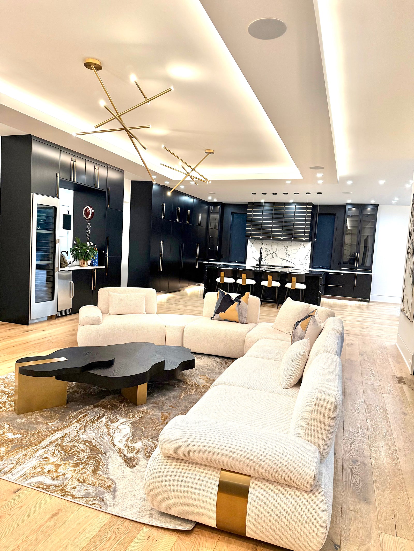 Contemporary Retreat in McLean living room in McLean Virginia featuring the Astor 5-Piece Modular Sectional and Mystic Dawn Counter Bar Stool