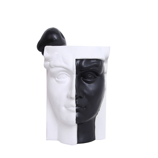Double Faced Ceramic Figurine